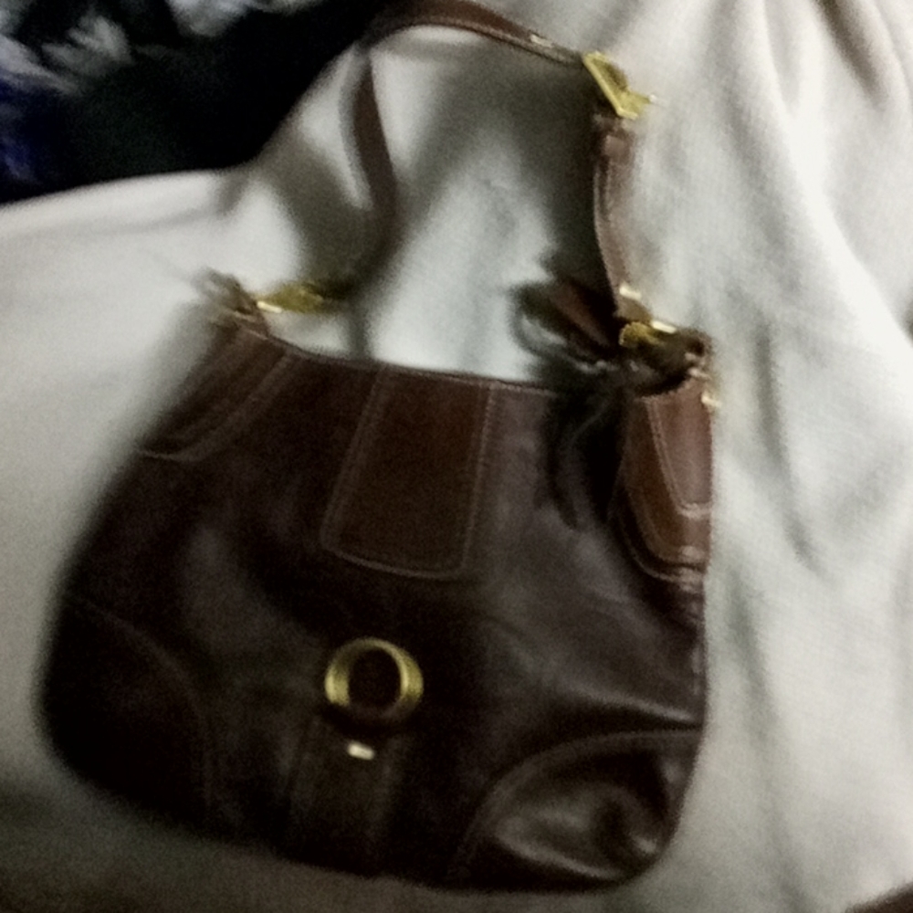 Brand new Coach women's handbag in the color brown